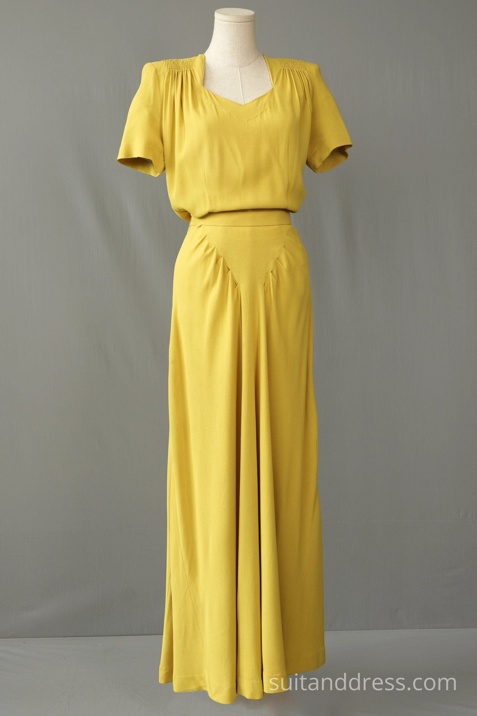 1940s evening gown dress in yellow crepe period costume hire for films in Riga Latvia