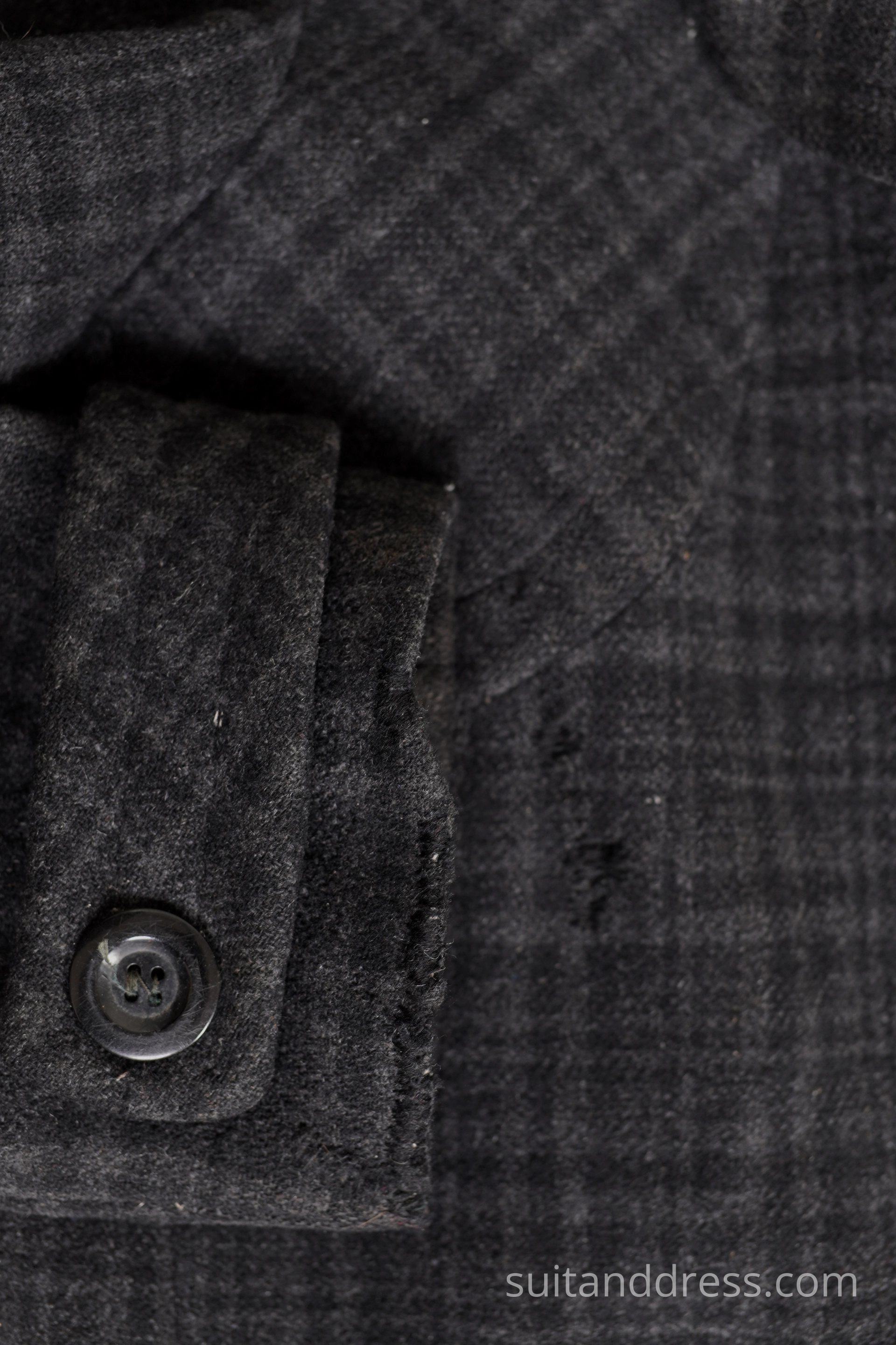 1970s plaid, darned coat
