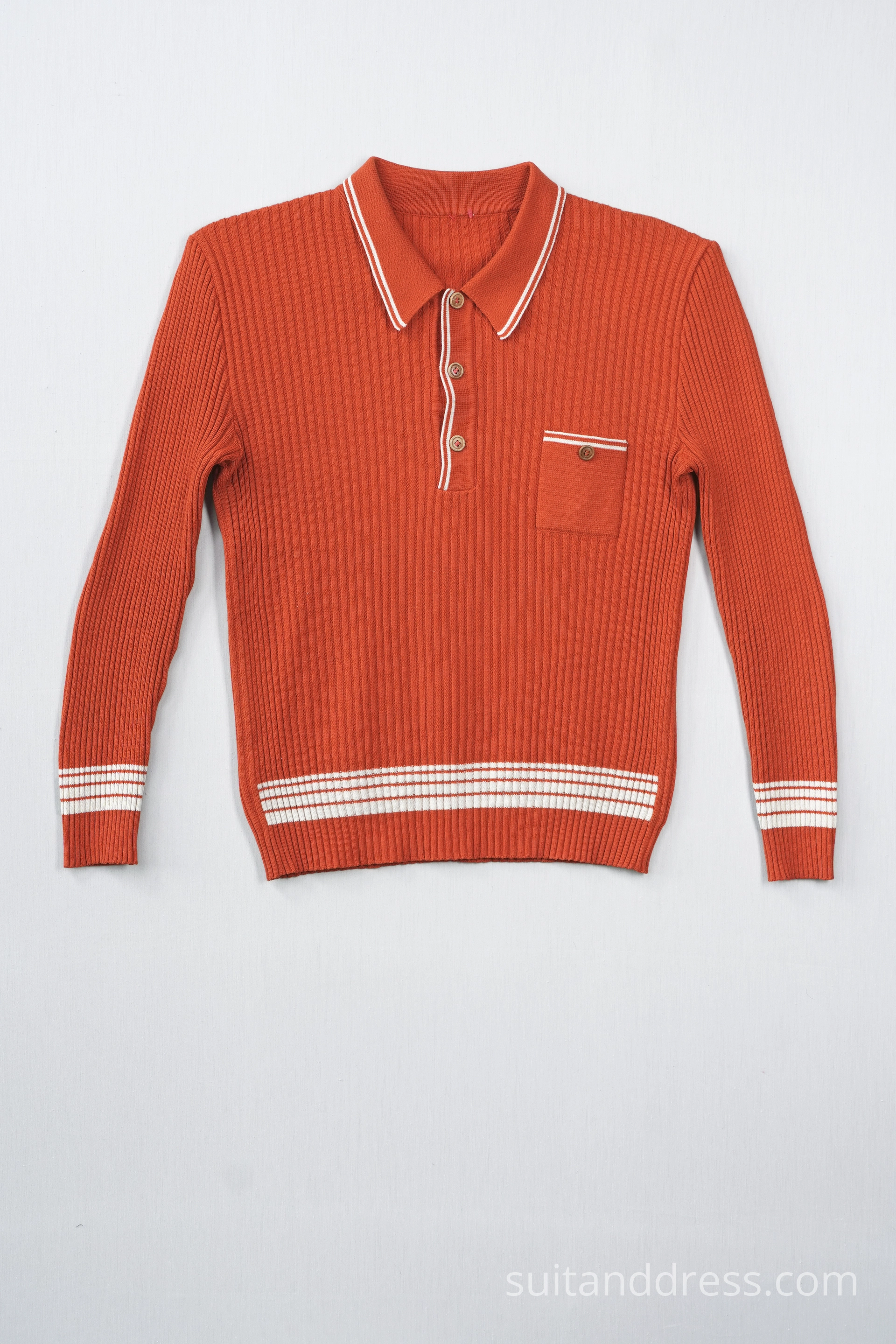 1970s sweater in bright orange vintage costumes warderobe rental for films in Riga Latvia