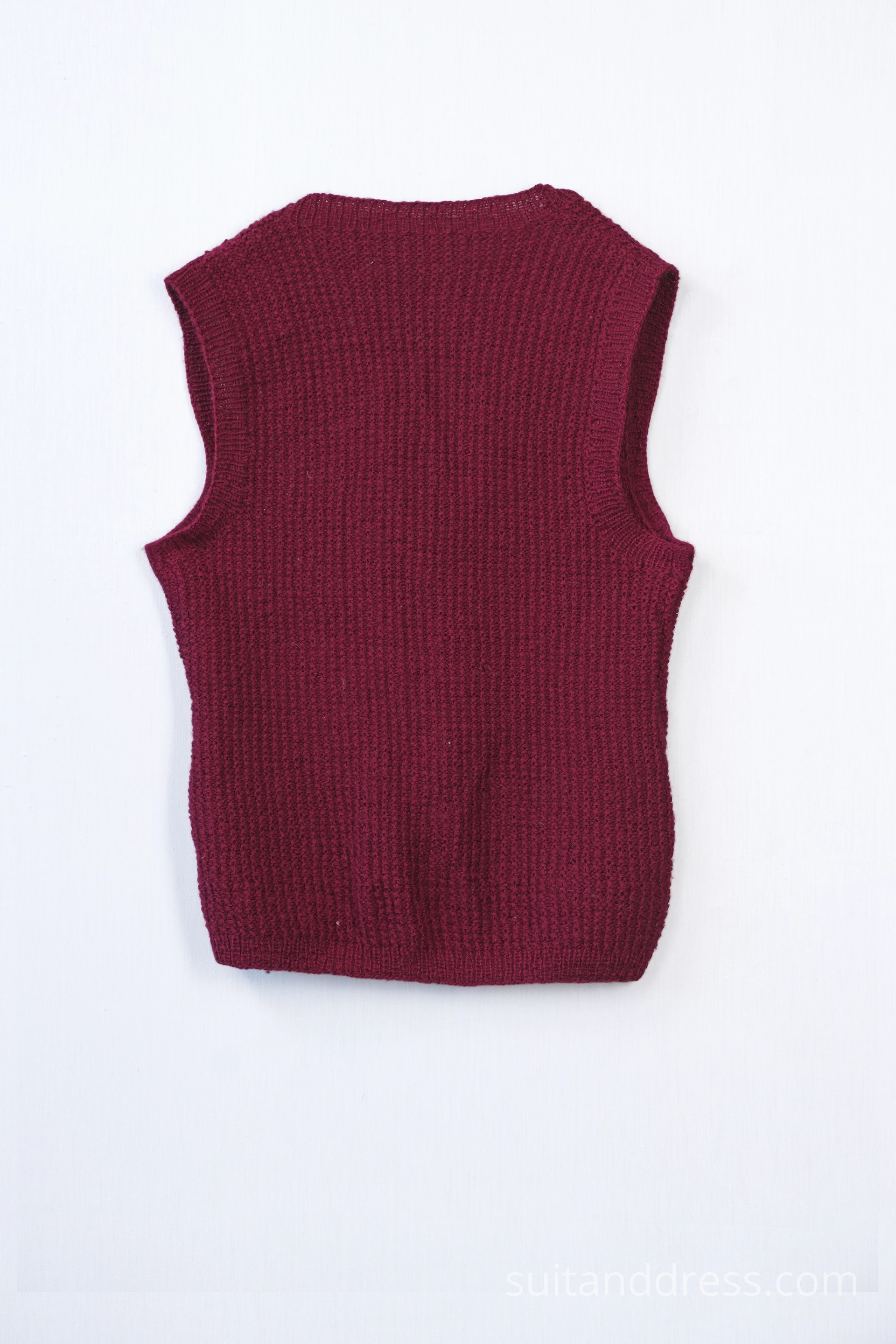 Mid century hand knitted ladies vest in burgundy vintage costume wardrobe rental for film in Riga Latvia