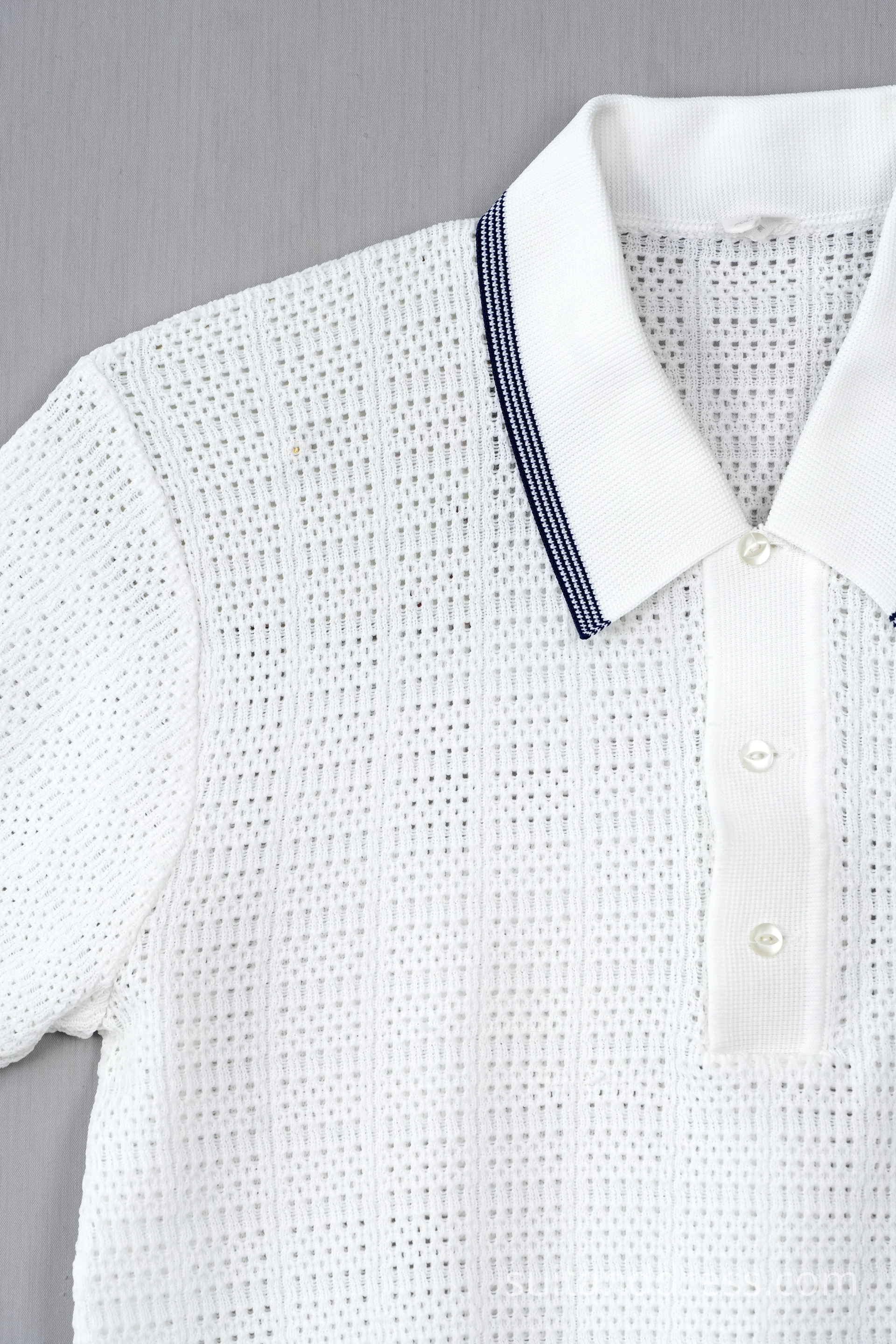 1970s 80s acrilic white mesh polo shirt film costume rental in Riga Latvia
