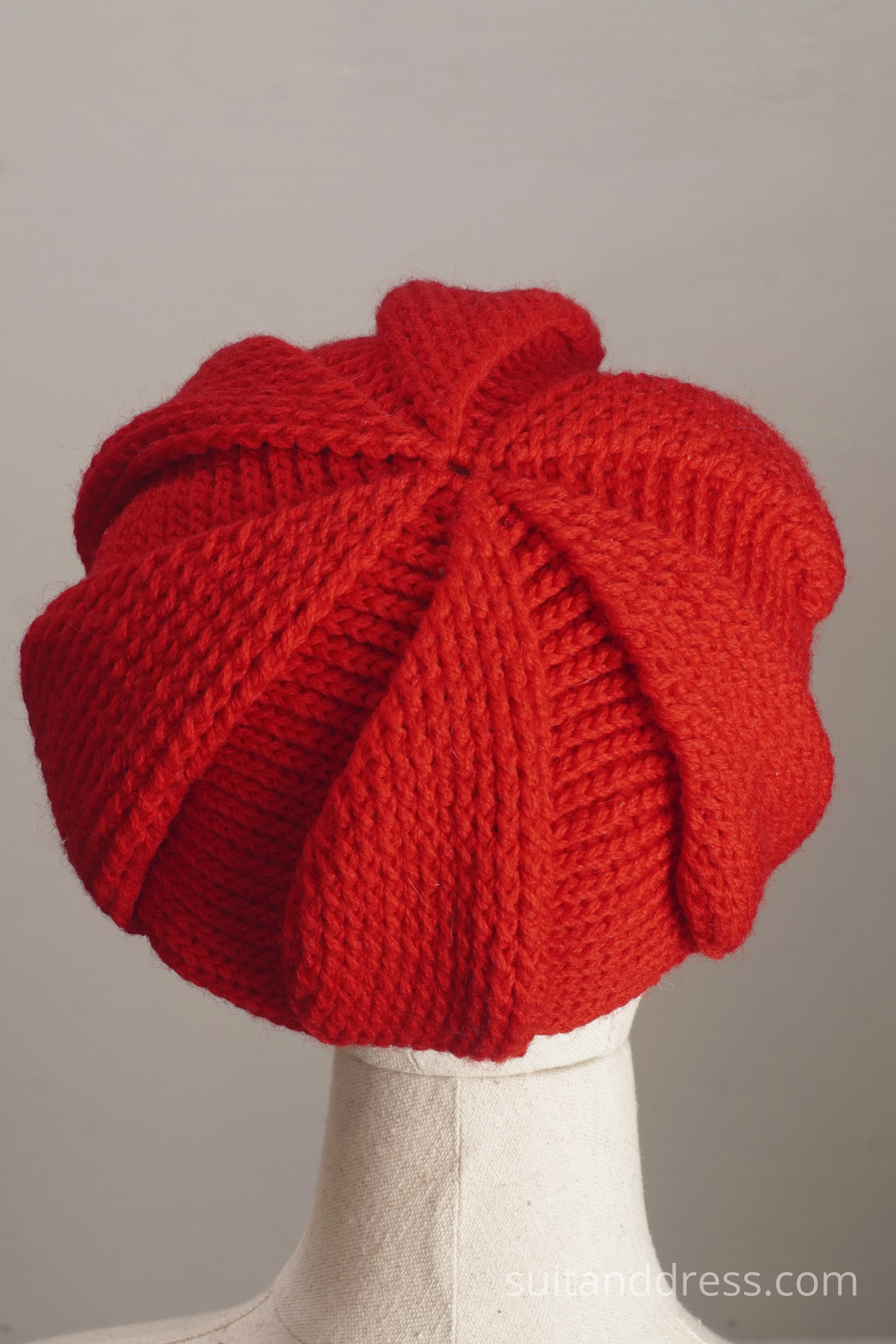 Hand knitted beret in bright red 1970s womens 70s winter fashion