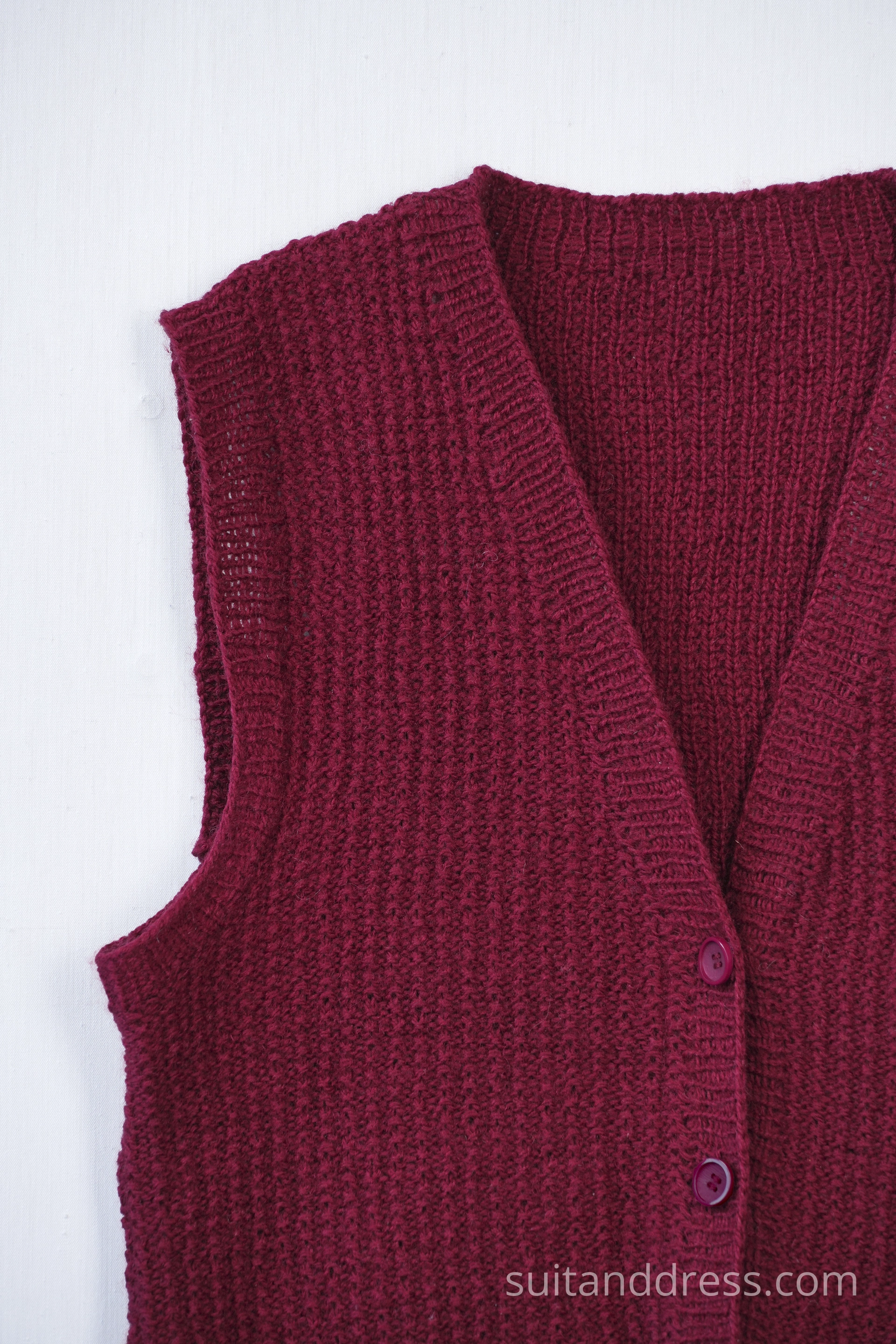 Mid century hand knitted ladies vest in burgundy vintage costume wardrobe rental for film in Riga Latvia